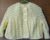 Hand- knitted baby cardigan in lemon. Approx 3 to 6 mths. All proceeds to The Stroke Association