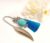 Turquoise centre owl bookmark with solid silver feather and turquoise tassel