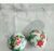 Set of 2 decoupaged polystyrene baubles, with holly and candy striped baubles design